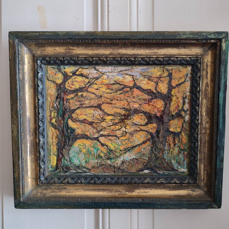 May include: A framed oil painting depicting a forest scene with two trees in the foreground and a background of yellow, orange, and green foliage.