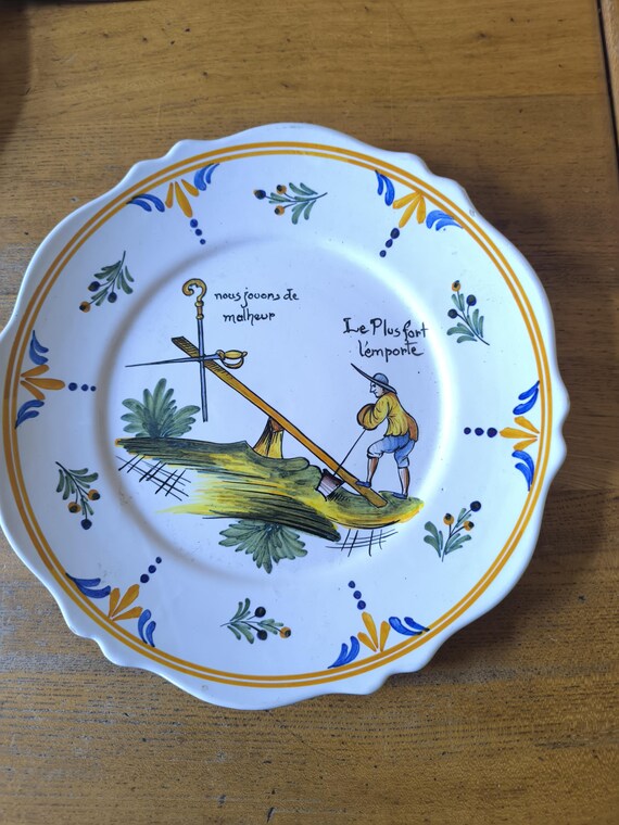 Antique Émile Tessier plate, revolutionary theme "we play with misfortune, the strongest prevails", French earthenware
