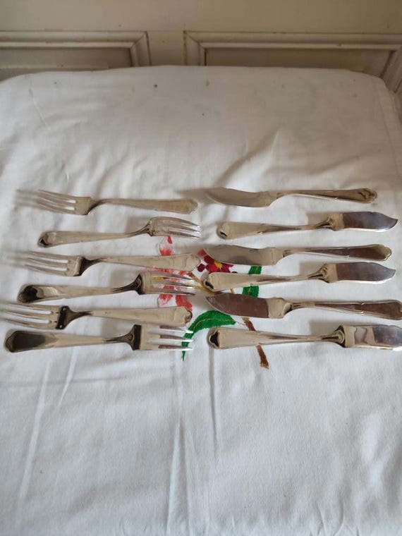 Guy Degrenne set of six silver-plated fish forks and six silver-plated fish knives, Contours model