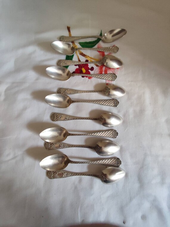 Boulenger 11 teaspoons silver metal with pretty decoration streaked shell and acanthus French goldsmith