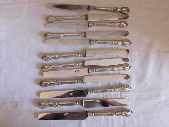Philippe Berthier set of twelve fruit knives with silver-filled handles 1841-1851 neck brace hallmark