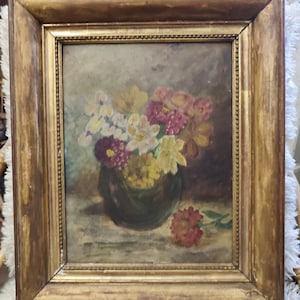 Huile sur carton signée "Nature morte au bouquet de fleurs " cadre bois doré datée 1936 école française