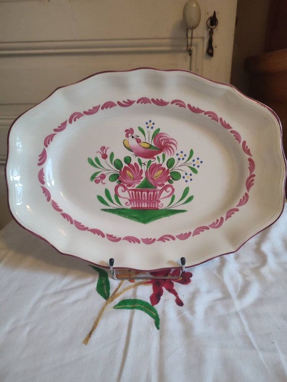 Oval earthenware serving dish by St Clément model Chanteclerc decoration with rooster and flowered basket