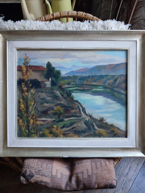 R. SORREL oil on canvas mounted on cardboard "Mountain landscape, river and farm" framed