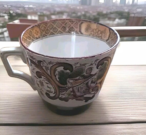 Sarreguemines tasse en faïence au Chinois jouant de la guitare 1875/1899