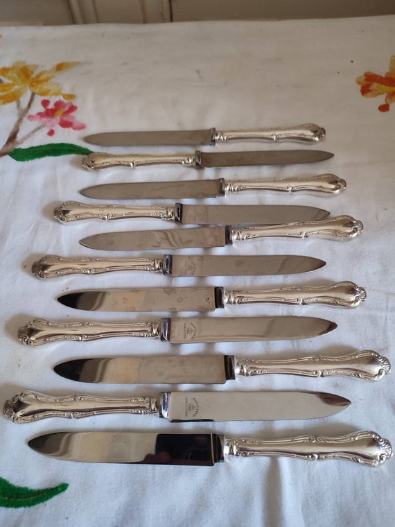 Mappin & Webb eleven small silver metal knives vegetable volutes