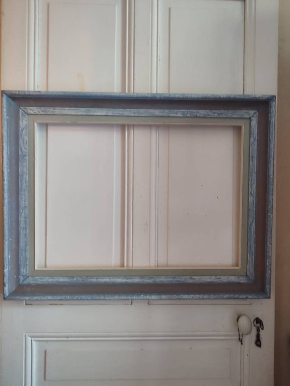Large Montparnasse frame in blue and brown patinated wood