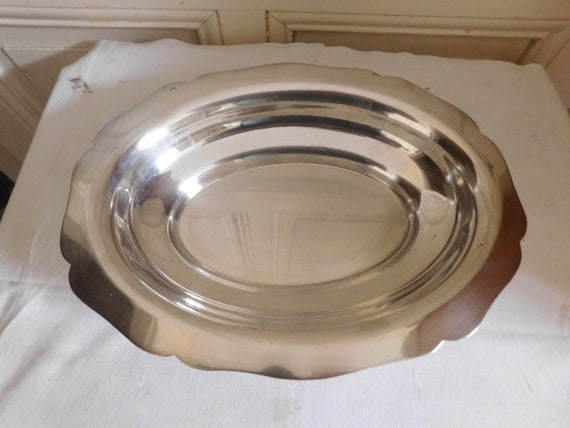 Roux Marquiand oval serving dish and hollow edges hectic shiny silver metal