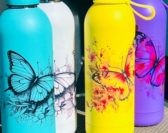 17 ounce stainless steel water tumbler with flower and Butterly's