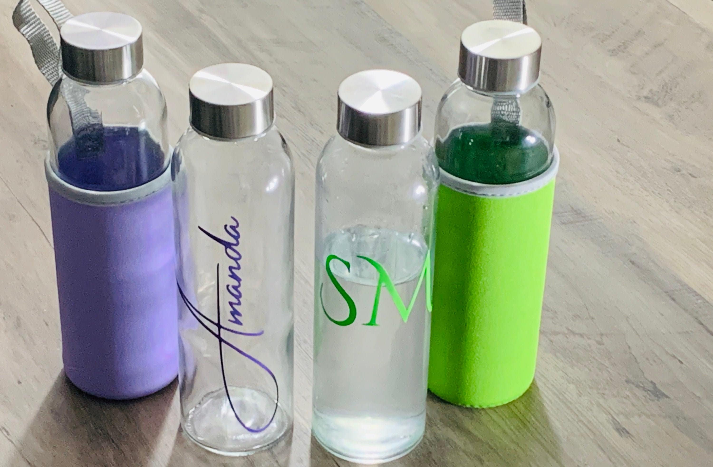 Custom Glass Water Bottle with Silicone Sleeve Suppliers and