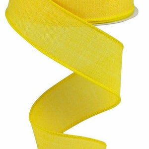 May include: A roll of bright yellow, textured ribbon. The ribbon is 2.5 inches wide and has a wired edge.