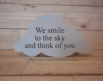 We smile to the sky and think of you engraved remembrance freestanding cloud. Memorial cloud.