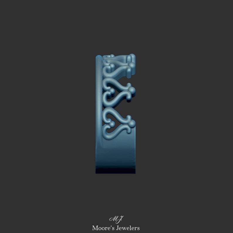 May include: A side view of a blue metal ring with a decorative design. The ring has a delicate, intricate pattern of swirls and curves.