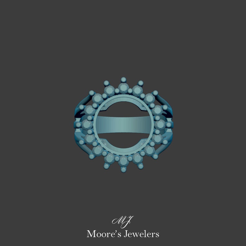 May include: A silver ring setting with a round center stone opening. The ring is decorated with a halo of small round stones.