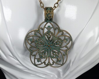 Flower filigree pendant.  Unique green patina necklace.  Boho style.  Beautiful design.  Large pendant.
