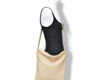 cream color coach purse