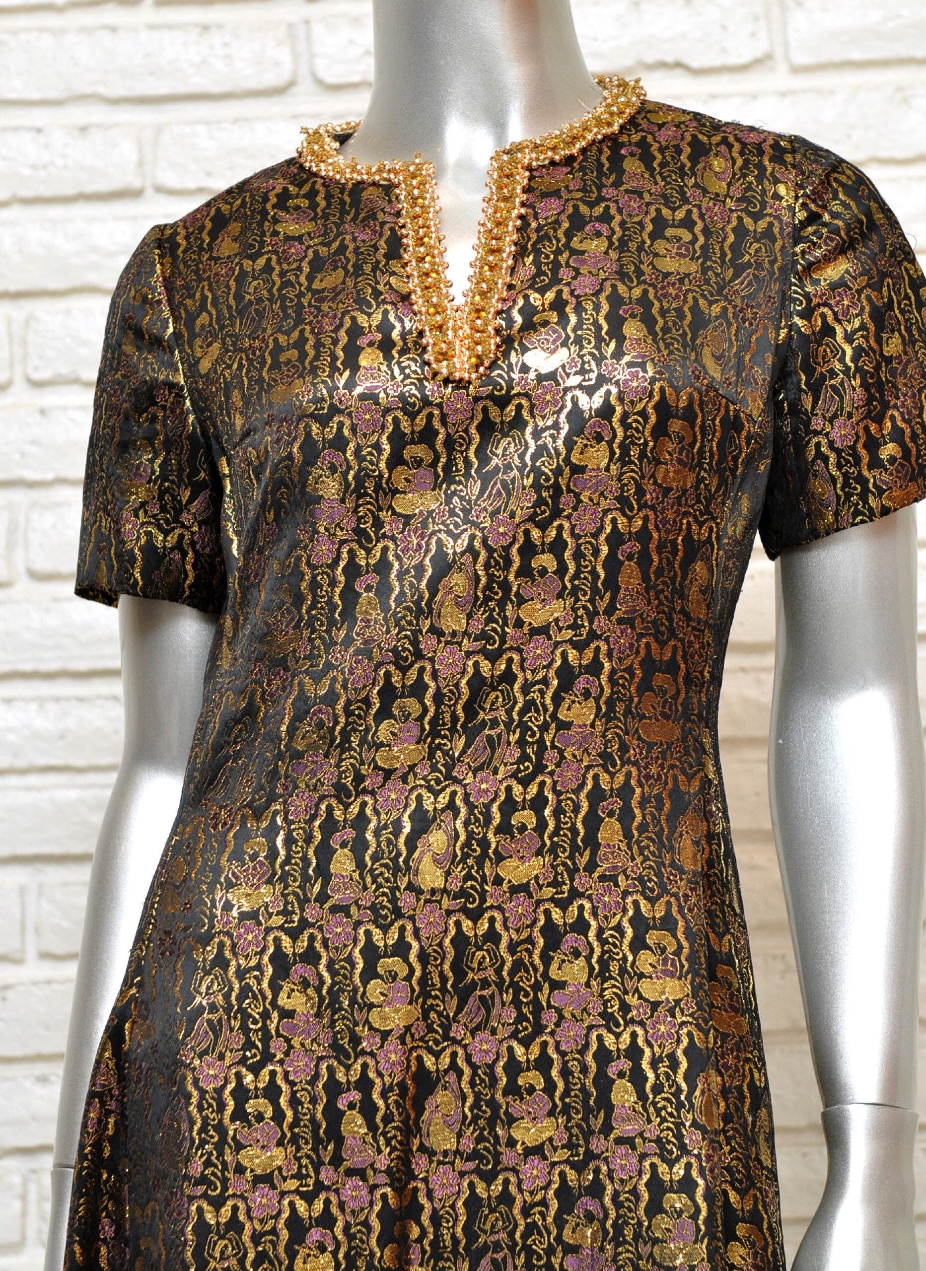 black dress with gold snake