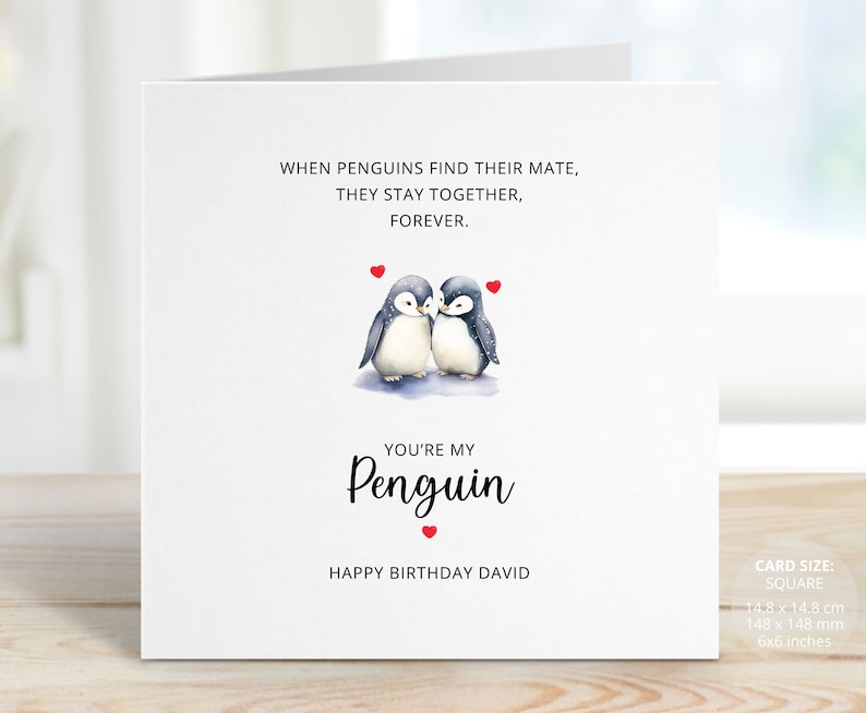 May include: A white card with a penguin couple illustration and the text "When penguins find their mate, they stay together, forever."  The card also says "You're my penguin" and "Happy Birthday David". The card size is 6x6 inches.
