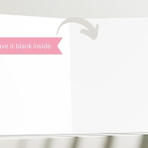 May include: A blank white card with a pink ribbon that says "Leave it blank inside".
