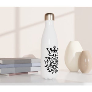 May include: White stainless steel water bottle with a black and gold design. The design features a crown and a monogram.