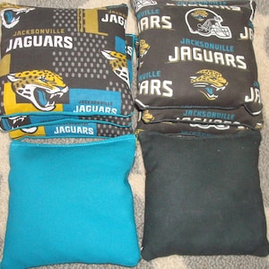 Clearance Sale!  Set of 8 Jacksonville Jaguars cornhole bags - regulation size