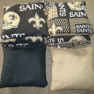 Clearance Sale!  Set of 8 New Orleans Saints cornhole bags - regulation size