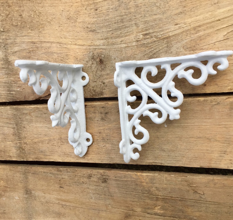 white shelf with brackets white shelf with brackets