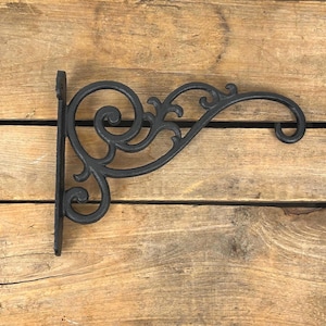 Gancho para colgar plantas negro: gancho decorativo de pared de hierro fundido