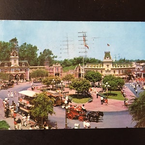 Vintage Disneyland Main Street U.S.A. Postcard - Town Square, Trolley, Street Car, Horse Drawn Carriage, Town Hall