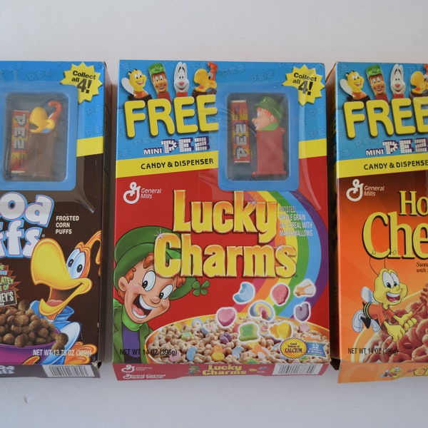 Cocoa Puffs/Lucky Charms/Honey Nut Cheerios, vintage cereal box, w/mini PEZ dispenser sealed on box, breakfast cereal, General Mills, 2002