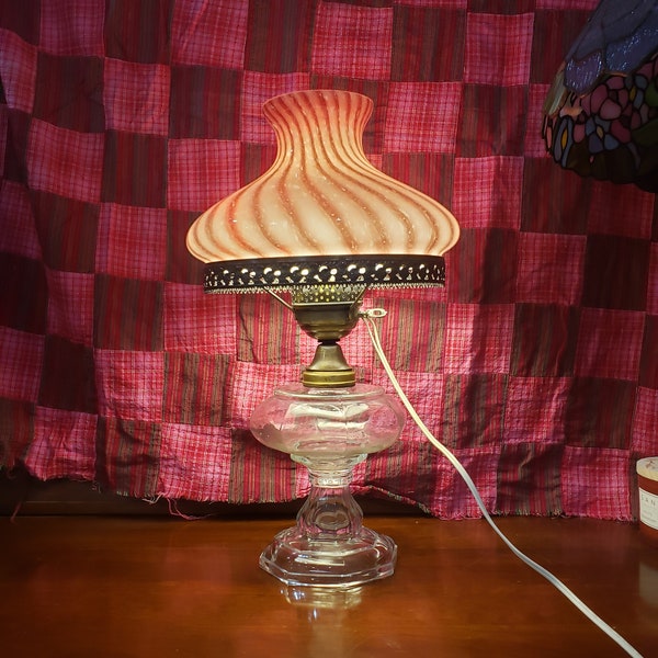 Clear Glass Oil Lamp Converted to Electric with a shade ring