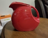 Fiesta Large Disk Pitcher in the color of Scarlet