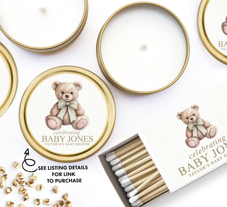 a collection of items related to baby showers, including teddy bears, candles, and matchsticks.