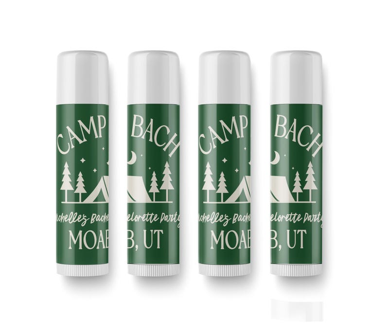 4 green tubes of balm with white text and graphics, arranged in a row.