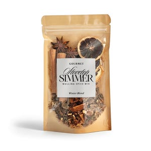 May include: A clear, resealable bag filled with a gourmet stovetop simmer spice mix. The bag contains star anise, cinnamon sticks, dried orange slices, and other spices. The label reads "Gourmet Stovetop Simmer Mulling Spice Mix Winter Blend."