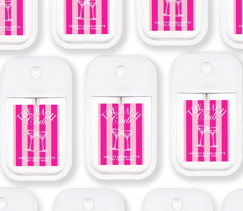 multiple white spray bottles with pink and white striped labels, each featuring the text "The Beach Club" and "Shelley's Bachelorette May 12, 2016 Miami".