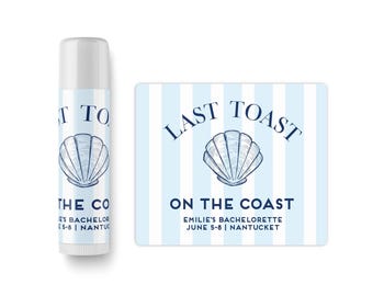 May include: A cylindrical lip balm tube and a rectangular sticker featuring a light blue and white vertical striped pattern. Both items display a dark blue seashell illustration and the text LAST TOAST ON THE COAST EMILIE'S BACHELORETTE JUNE 5-8 | NANTUCKET.