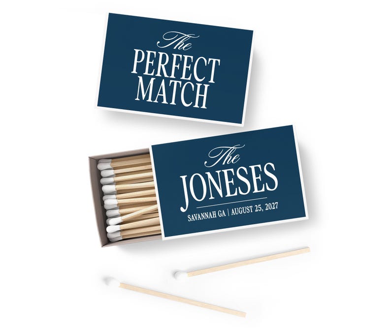 a set of matchsticks with a blue label that reads "The Perfect Match" and "The Joneses" written on them.