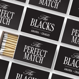 a collection of black and white matchbox labels, each featuring the text "The Perfect Match" and the names "Amanda + Charles".