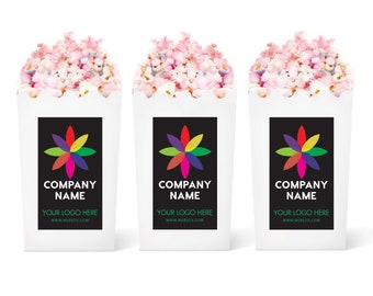 May include: Three white popcorn boxes with a black label. The label has a colorful logo of a flower with a white outline and the text "COMPANY NAME" and "YOUR LOGO HERE" and "www.WEBSITE.COM".