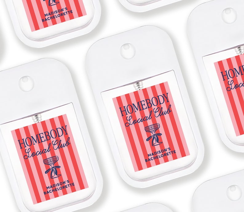 multiple identical white spray bottles with red and blue labels, each featuring the text "HOMEBODY Madison's Bachelorette" printed on them.