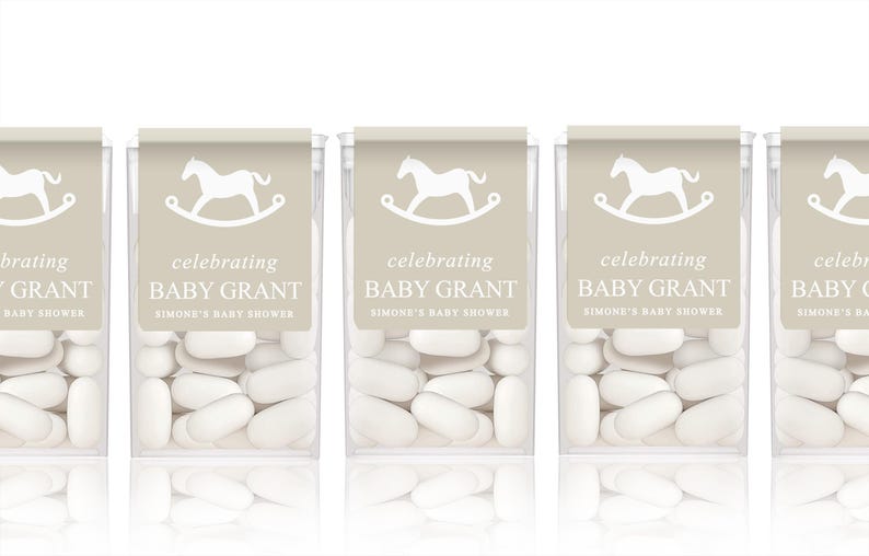 May include: Five clear plastic containers filled with white mints. Each container has a beige label with a white rocking horse and the text "celebrating Baby Grant Simone's Baby Shower".