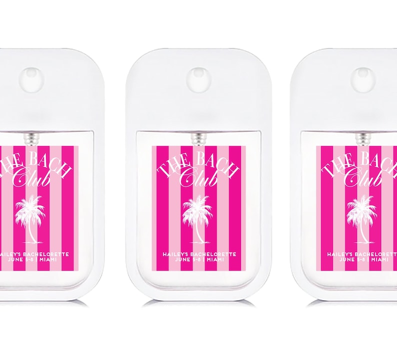Three identical white spray bottles with pink and white labels that say "The Beach Club" and "Haisley's Bachelorette June 5-8 Miami".