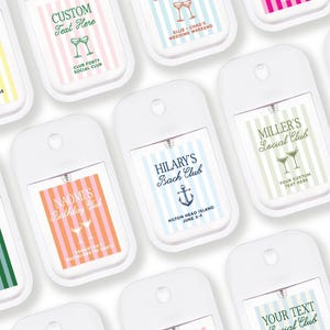 a collection of hand sanitizer bottles with various labels, including custom text and logos.