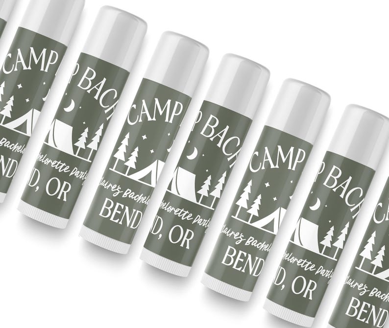 A row of identical camping-themed lip balms with the text "Camp Bend" printed on them.