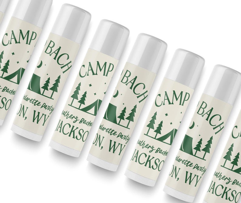 a row of identical tubes of lotion with a green and white label that reads "Camp Bach Jackson, WV".