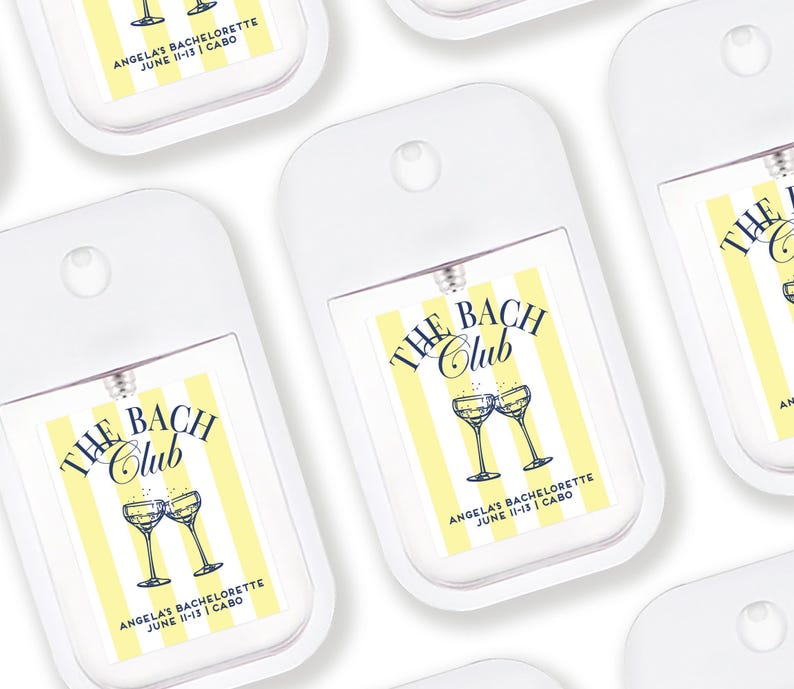 multiple identical white hand sanitizer dispensers with a yellow and white striped design.