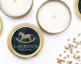 May include: Gold candle tins with a plaid design and a rocking horse graphic. The label reads "Lauren's Baby Shower".