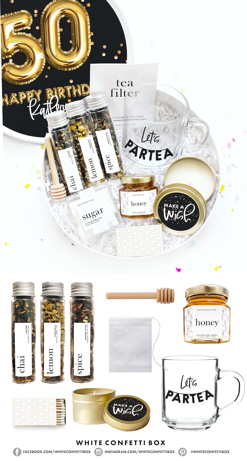 May include: A white gift box filled with tea-themed items for a 50th birthday. The box includes a glass mug with the text "Let's Partea", tea infusers, honey, sugar, a candle, and matches. The box is decorated with gold confetti and a black and gold "Make a Wish" sticker.