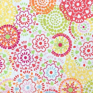May include: A white background is covered with a repeating pattern of colorful, circular floral designs. The flowers are in shades of red, pink, orange, yellow, green, and blue. The design is reminiscent of a textile or fabric.